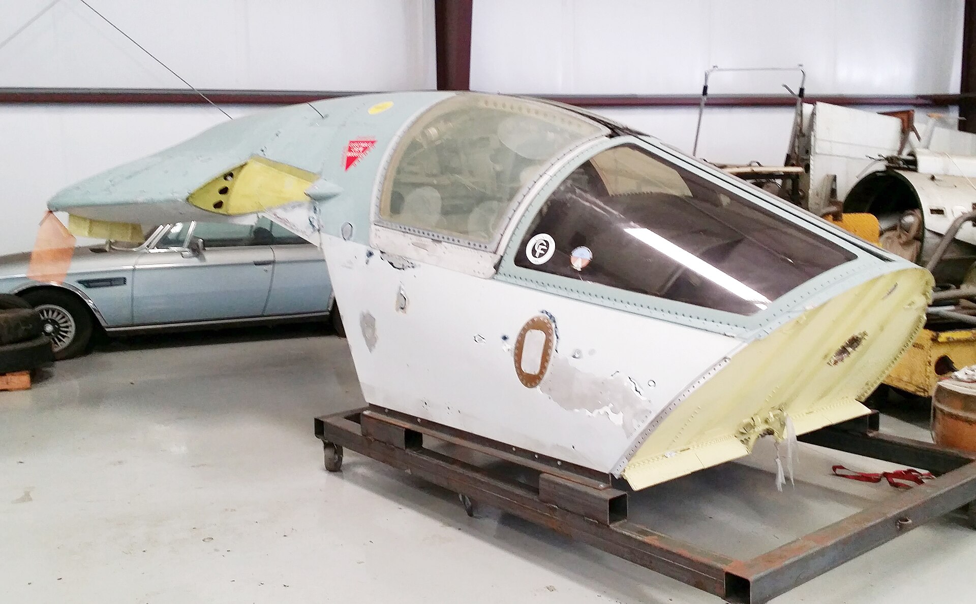 A preserved General Dynamics F-111 crew escape capsule on museum display
