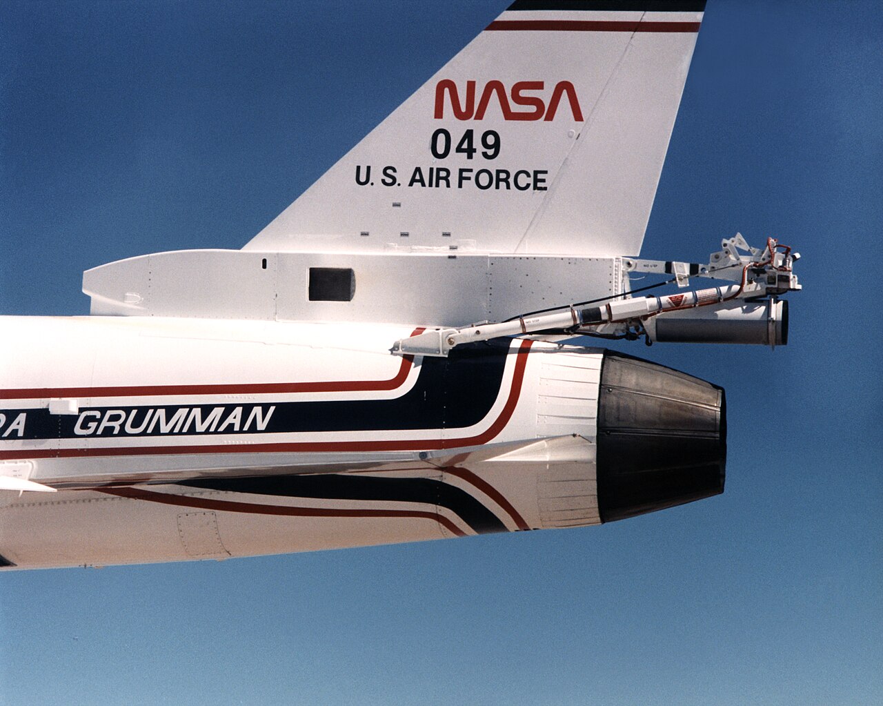 Tail-mounted spin recovery parachute system on the Grumman X-29