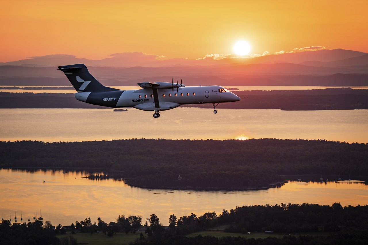 The Heart Aerospace X1 battery-electric demonstrator flying at sunset