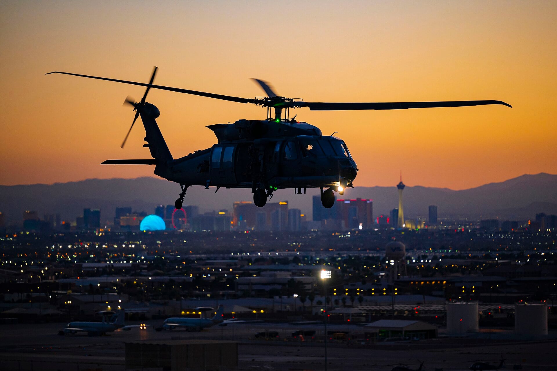 An HH-60W Jolly Green II combat rescue helicopter taking off