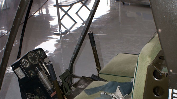 The open cockpit of a preserved Hiller YH-32 Hornet