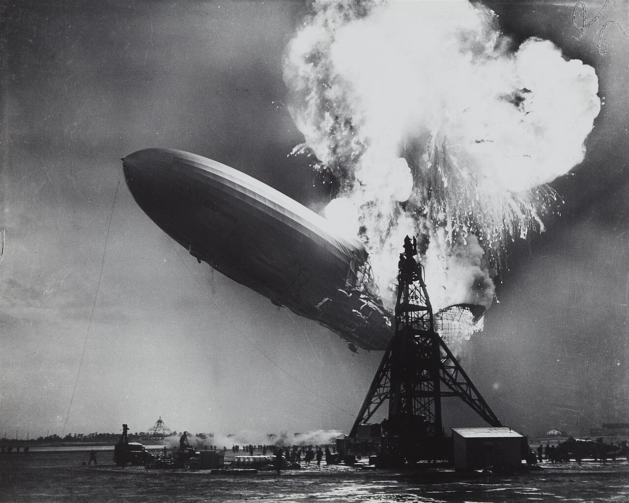 The Hindenburg on fire near the mooring mast at Lakehurst