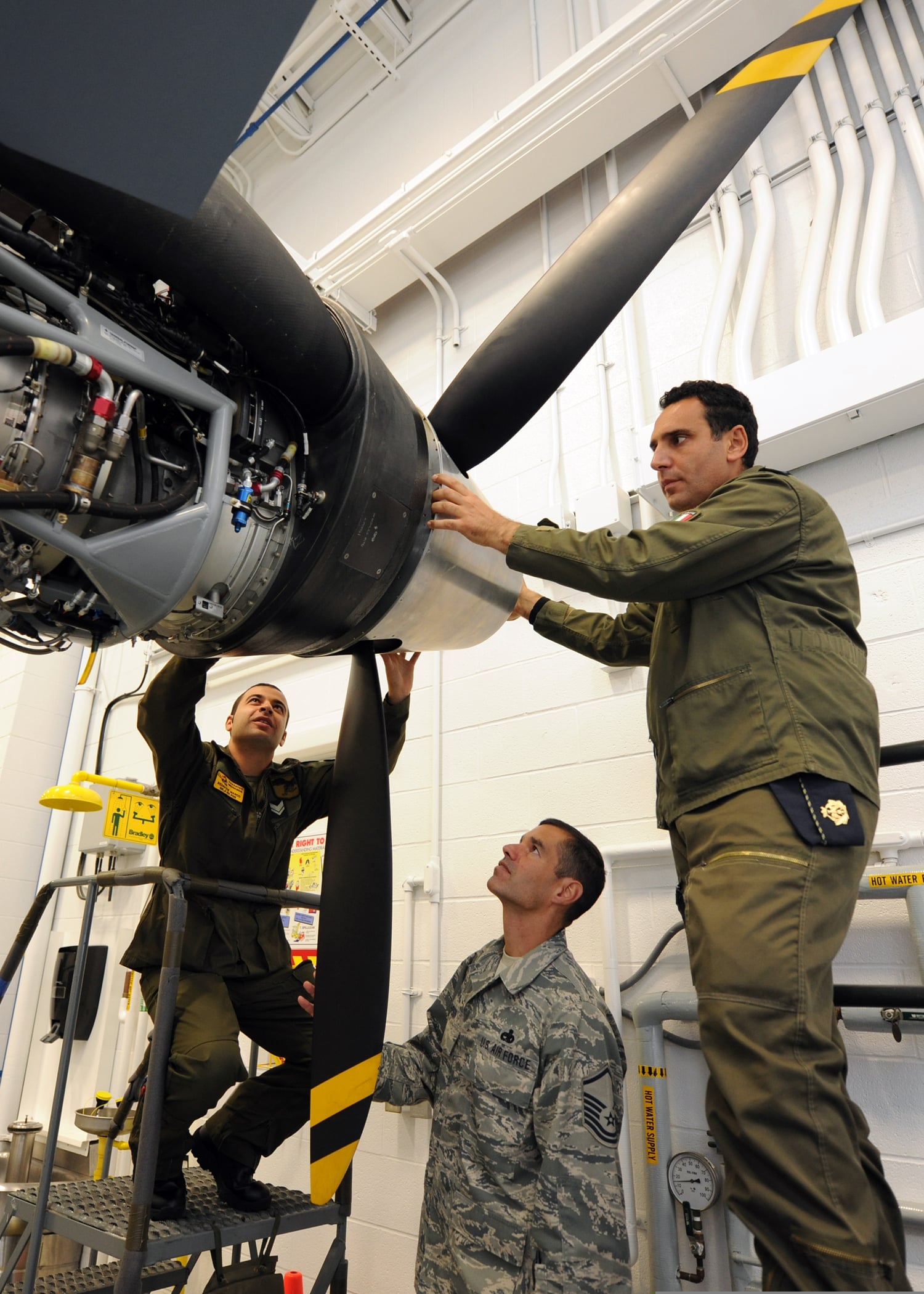 Italian Air Force personnel working on an MQ-9 Reaper