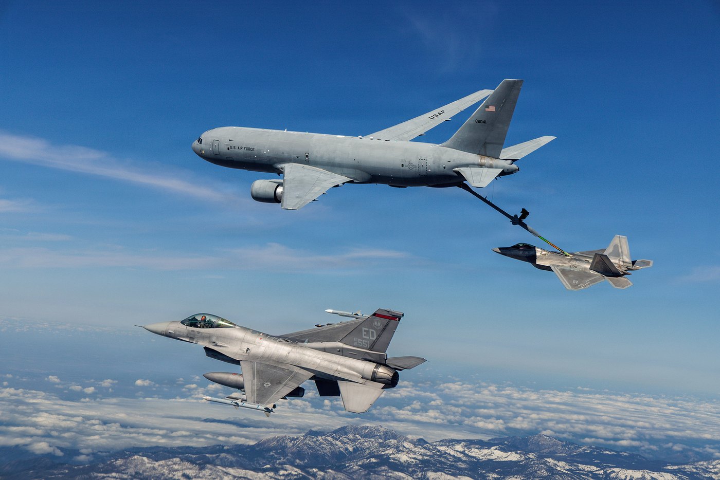 A KC-46 Pegasus refuelling an F-22 Raptor over the Mojave Desert