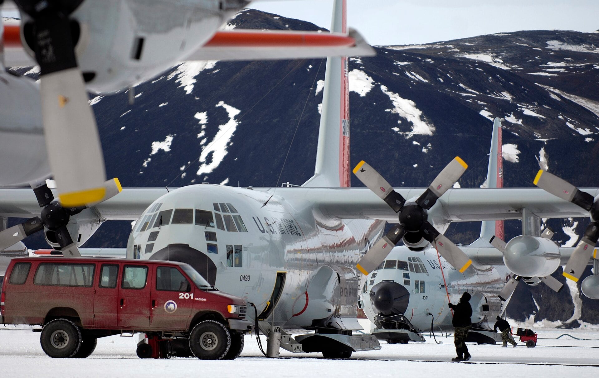 Ski-equipped LC-130 Hercules parked on the ice near McMurdo Station, Antarctica, during Operation Deep Freeze