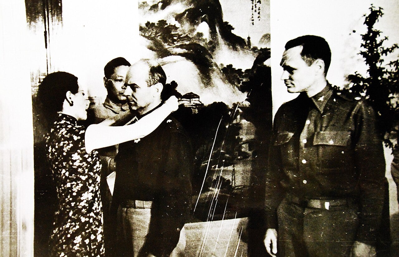 Madame Chiang Kai-shek awarding the Military Order of China to Brigadier General James Doolittle, 1942