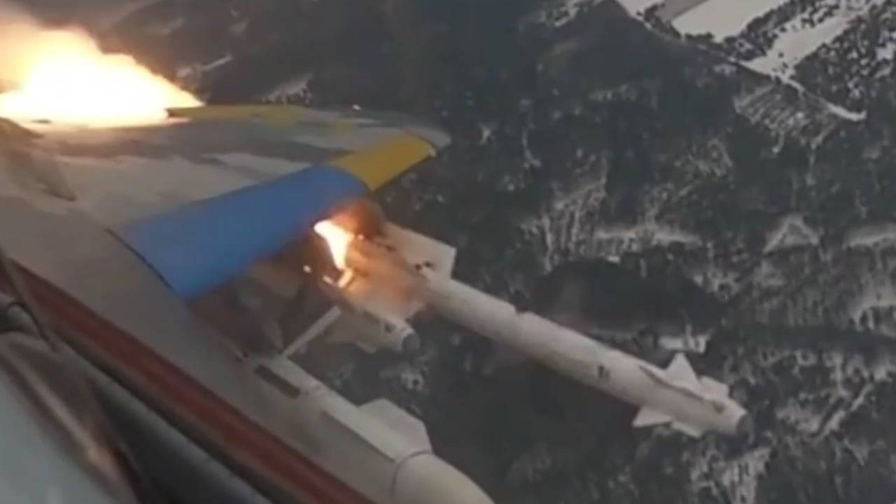 An R-73 short-range air-to-air missile leaving the rail of a MiG-29