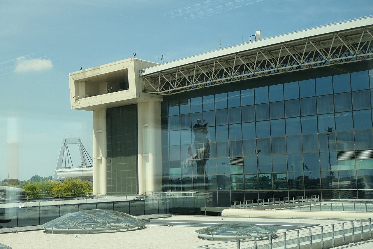 The glass facade of Terminal 1 at Milan Malpensa Airport