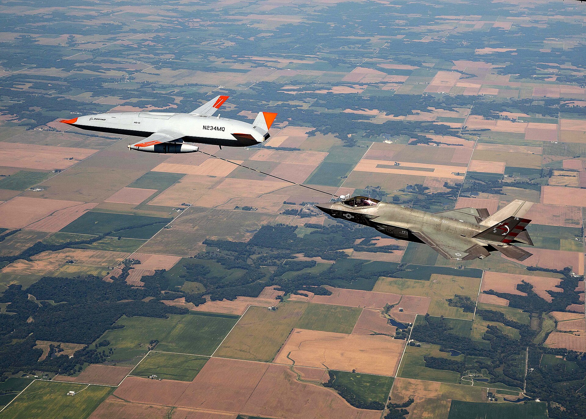 MQ-25 Stingray refuels an F-35C