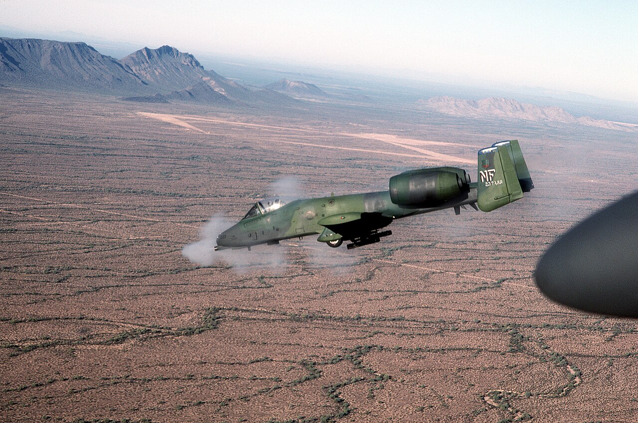 An OA-10 Thunderbolt II firing its GAU-8/A Avenger 30 mm cannon at a target range