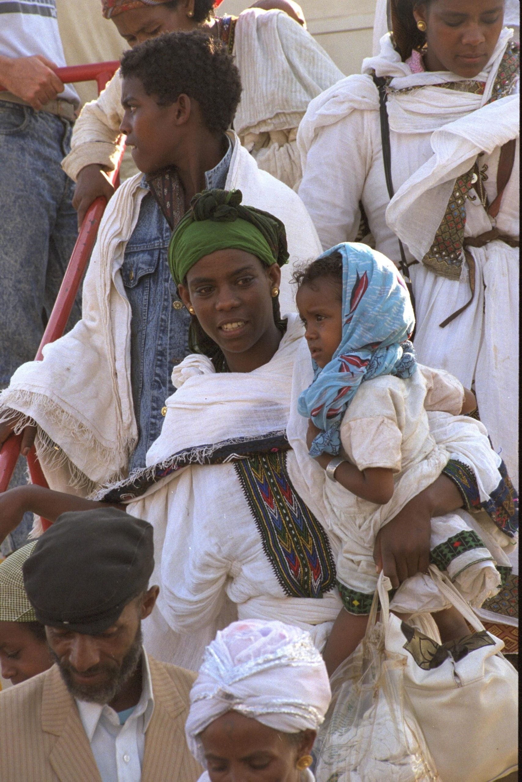 Ethiopian immigrants disembarking from a Boeing jet at an Israeli air force base, 1991