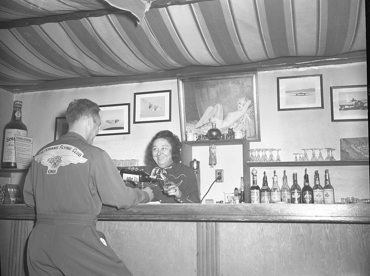 Pancho Barnes at the Happy Bottom Riding Club Pancho Barnes behind the bar at the Happy Bottom Riding Club near Edwards Air Force Base