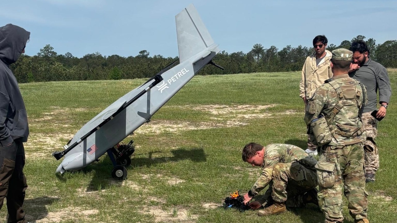 Soldiers of the 101st Airborne Division fitting FPV strike drones to a Petrel AERO Sky at Fort Polk