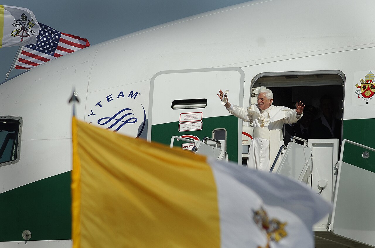 Pope Benedict XVI waves from the door of the Alitalia papal plane at Andrews Air Force Base, 2008