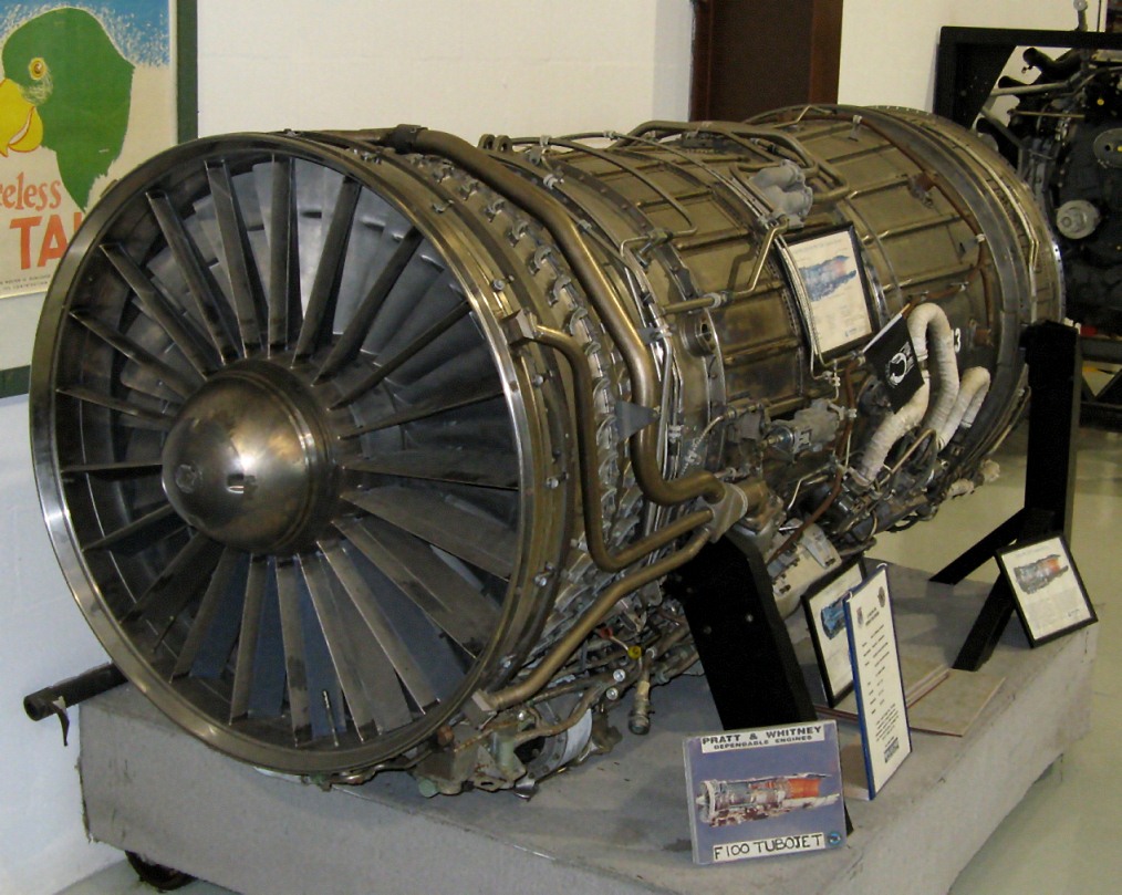 A Pratt and Whitney F100 engine on display showing the inlet fan face