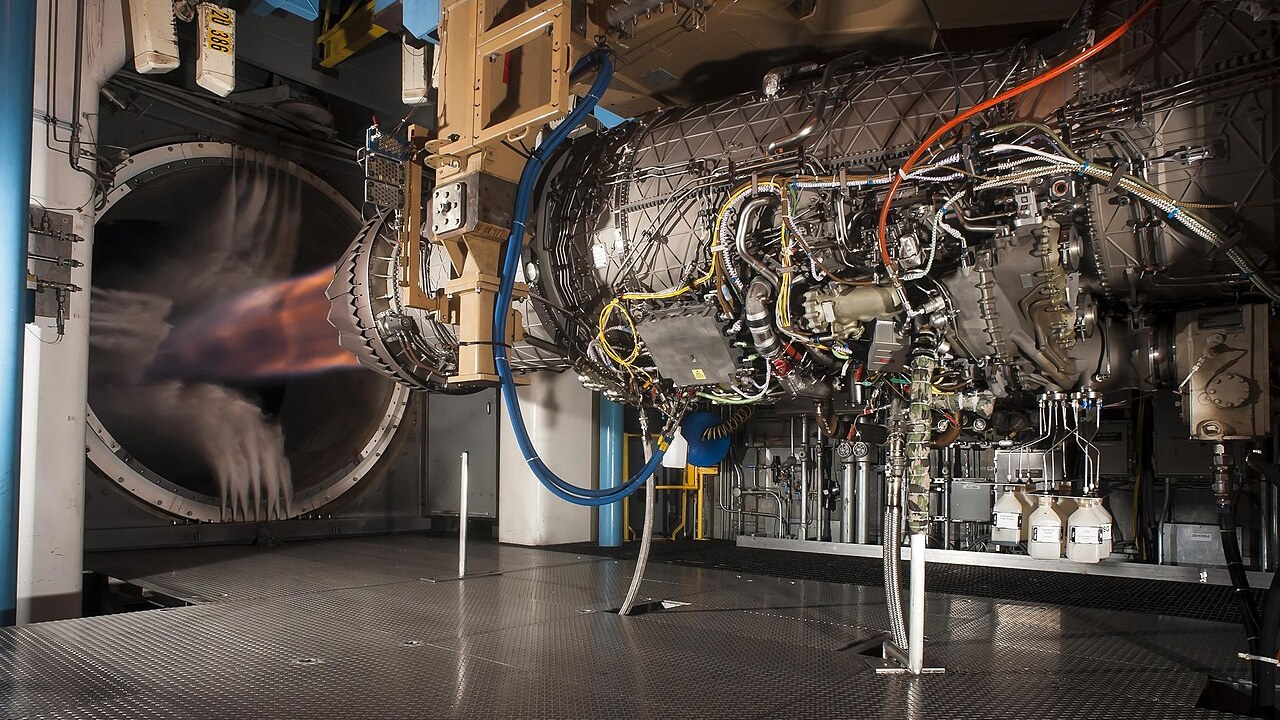A Pratt and Whitney F135 engine running in a test cell with the afterburner lit