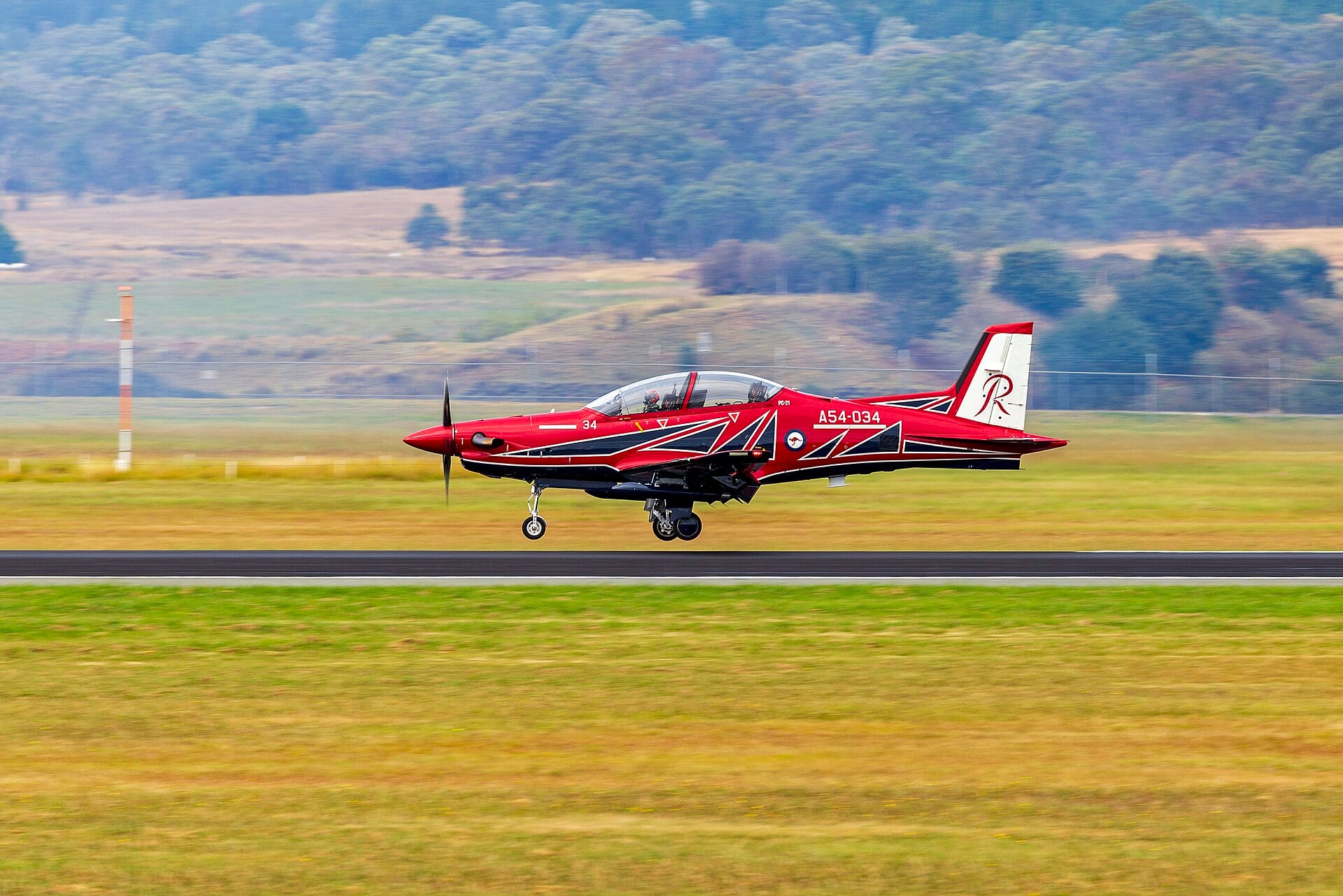 A Royal Australian Air Force Roulettes Pilatus PC-21 landing at Canberra Airport