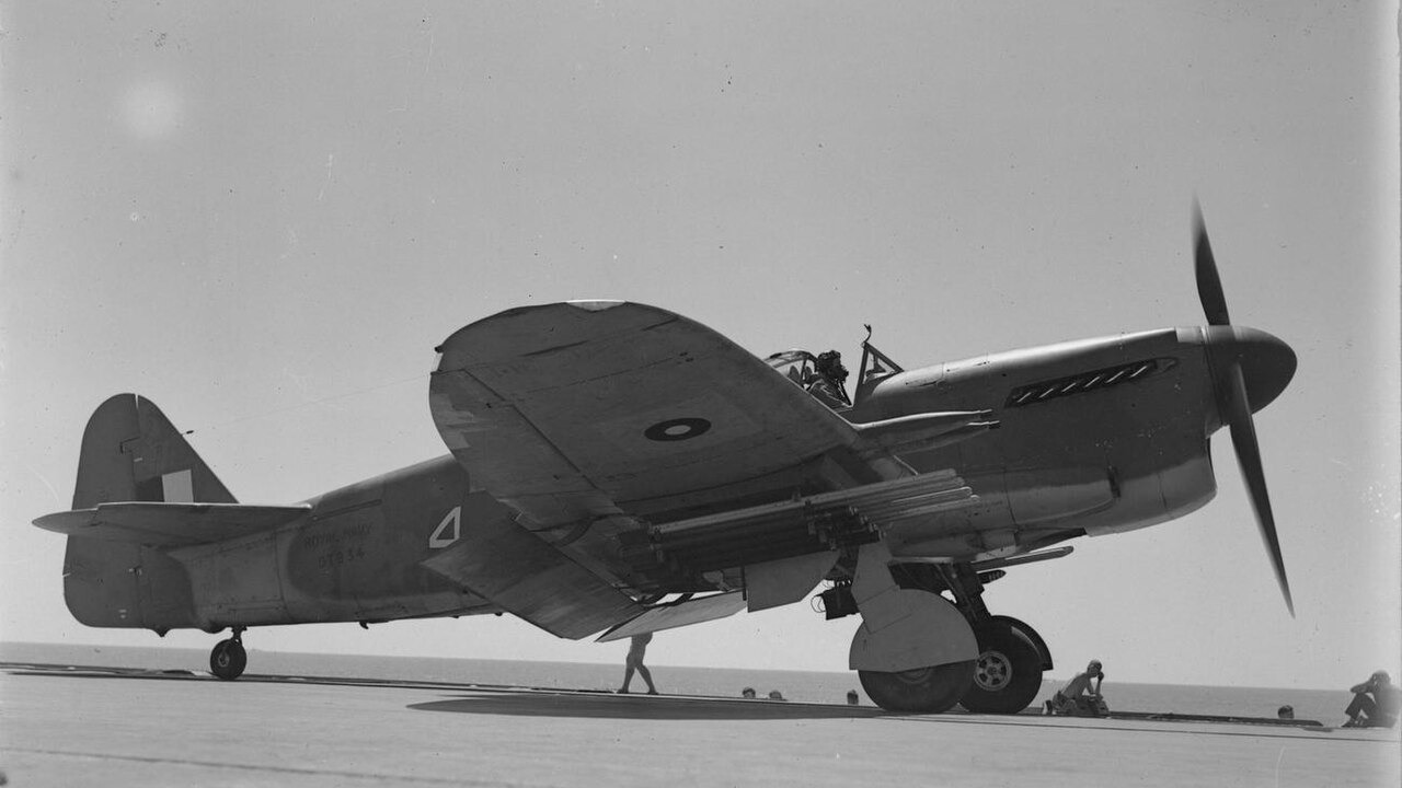 A rocket-armed Fairey Firefly of 1770 Squadron waiting to take off from HMS Indefatigable