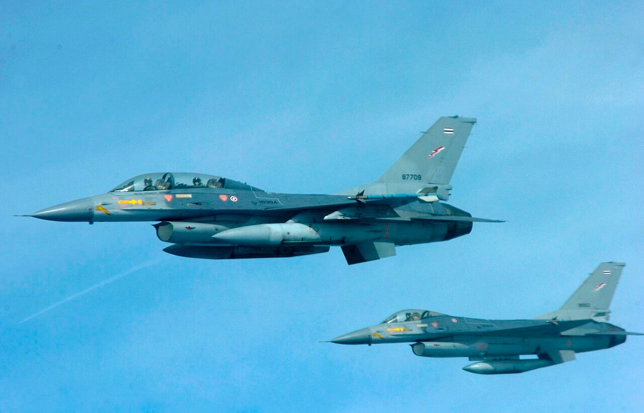 Two Royal Thai Air Force F-16s Two Royal Thai Air Force F-16s flying in formation over Thailand