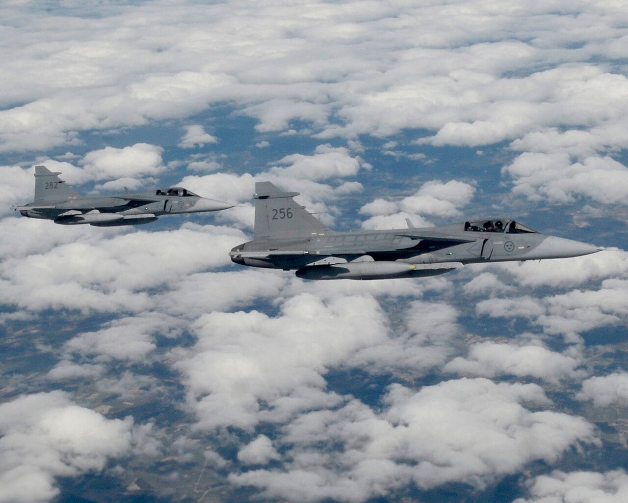 Two Saab JAS 39 Gripens of the Swedish Air Force in flight