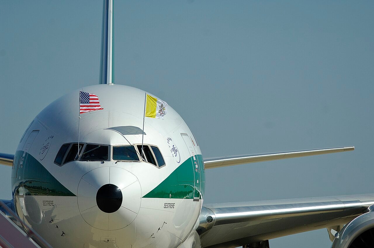Alitalia airliner flying as Shepherd One with US and Vatican flags at Andrews Air Force Base, 2008