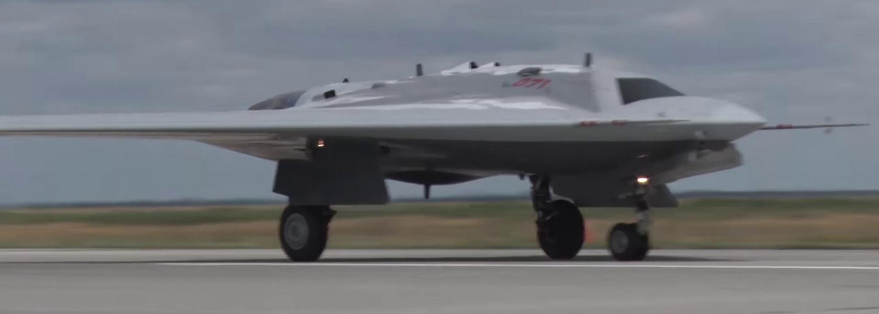 The Sukhoi S-70 Okhotnik stealth combat drone during takeoff
