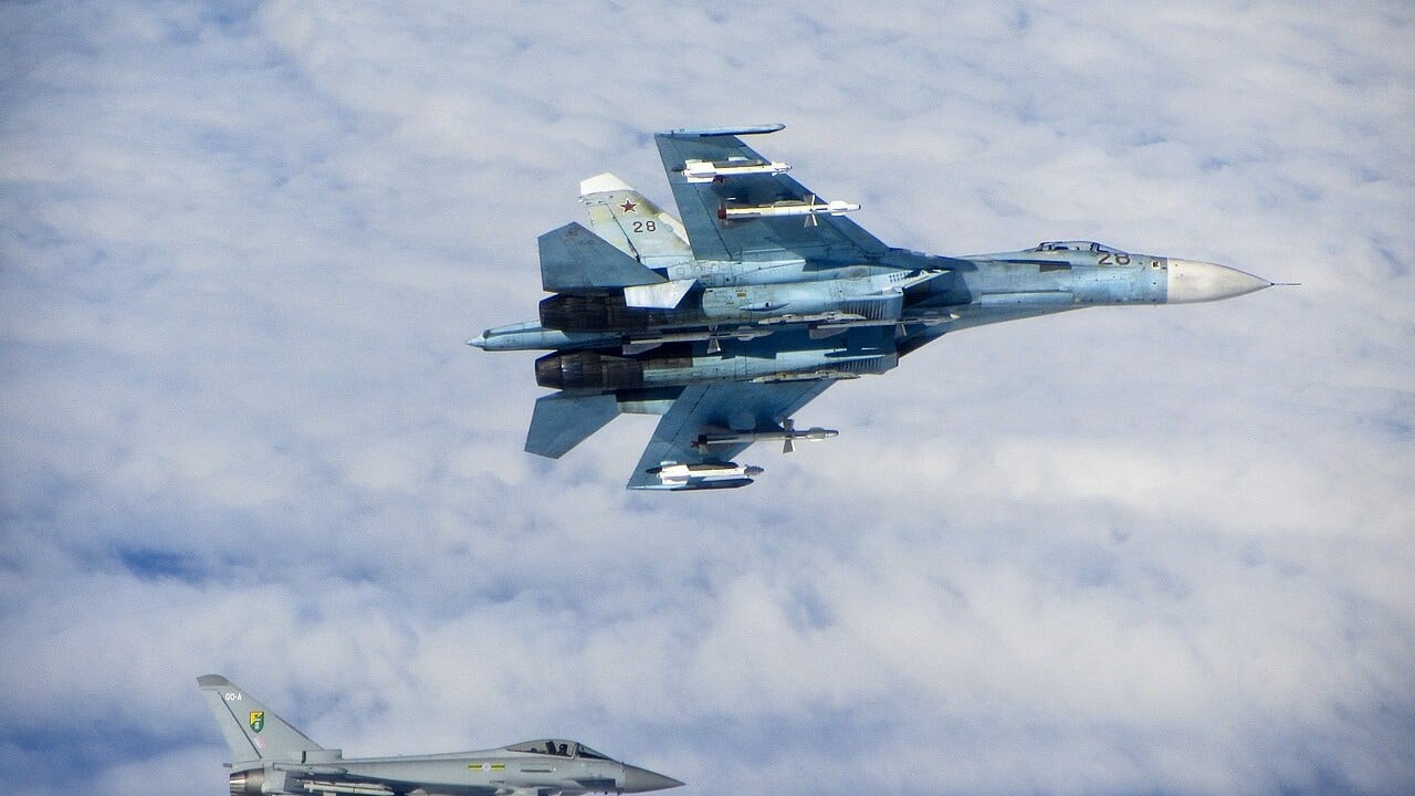 Sukhoi Su-27 Flanker armed intercept An armed Russian Su-27 Flanker carrying R-27 and R-73 missiles, shadowed by an RAF Typhoon