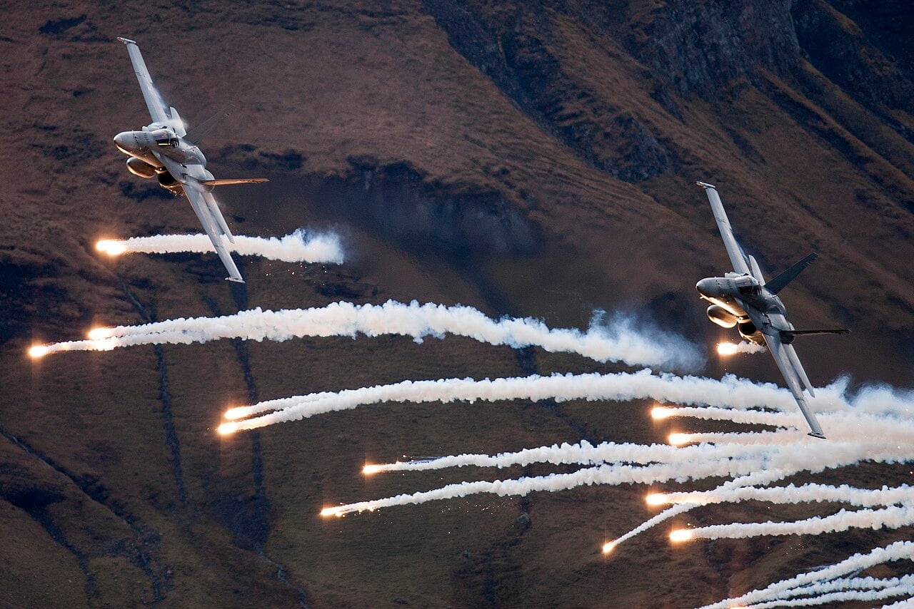 Swiss Air Force F/A-18 Hornet firing during the Axalp live-fire demonstration