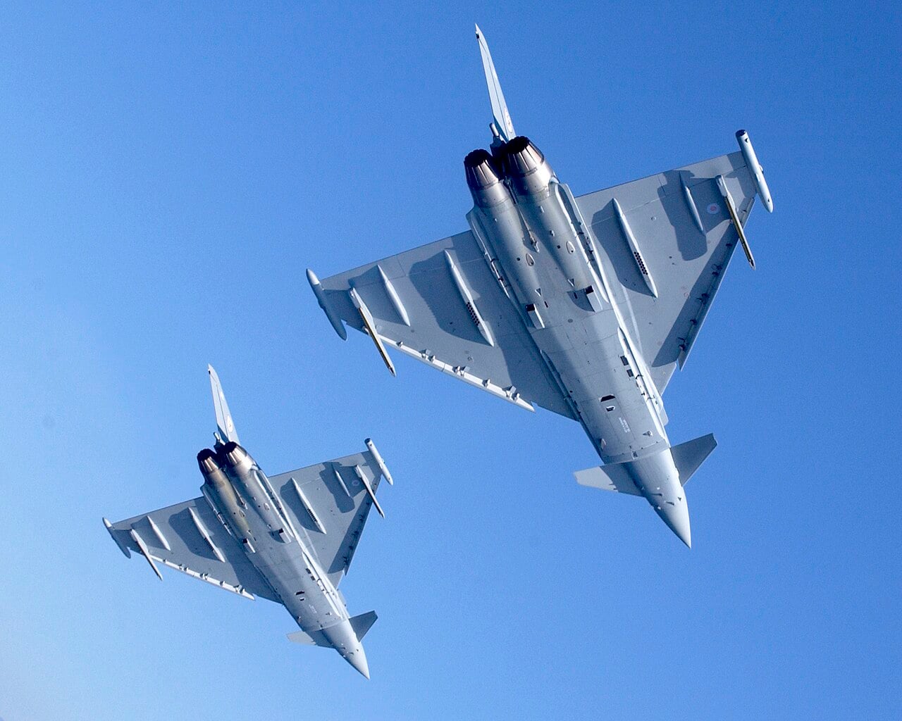 Two Eurofighter Typhoons of 29 Squadron seen from below
