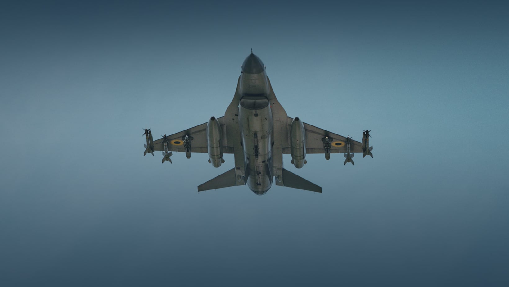 Ukrainian Air Force F-16 in flight Ukrainian Air Force F-16 Fighting Falcon in flight seen from below