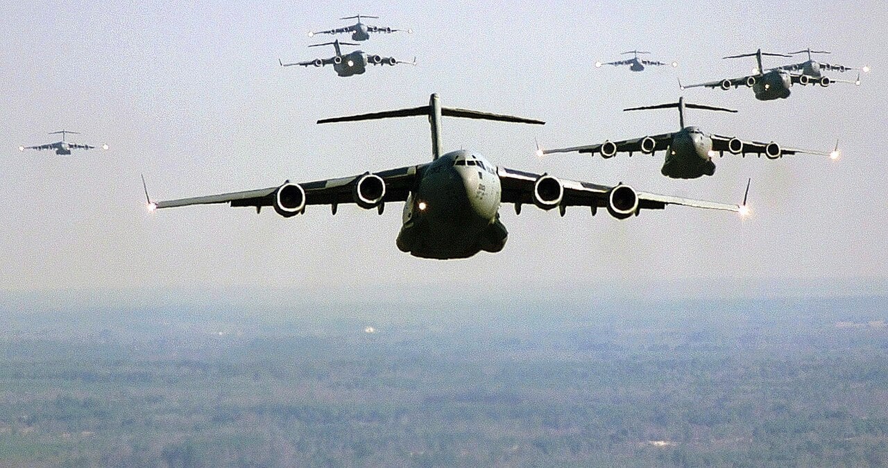 A formation of US Air Force C-17 Globemaster III transports in flight