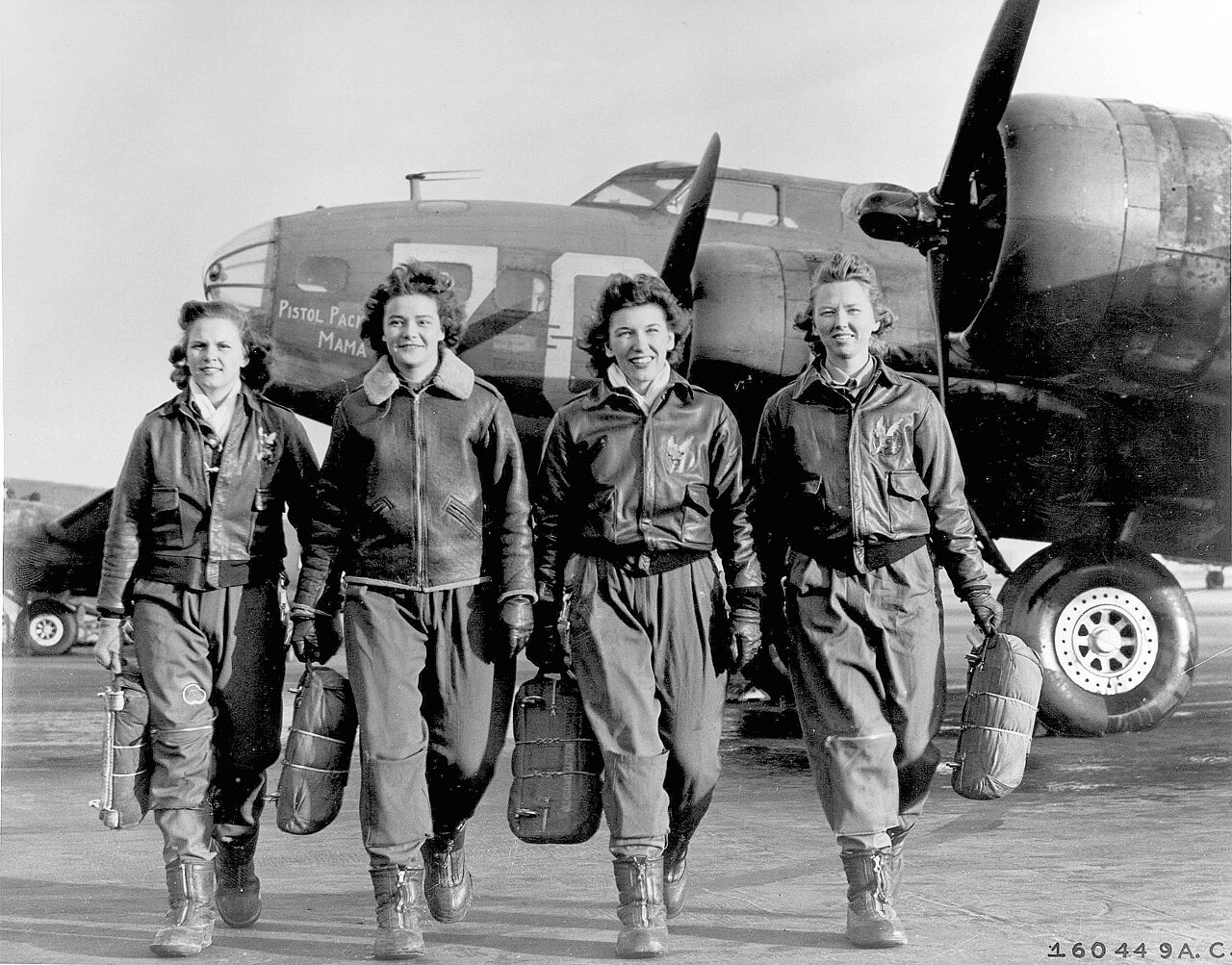 WASP pilots walking away from the B-17 Pistol Packin’ Mama