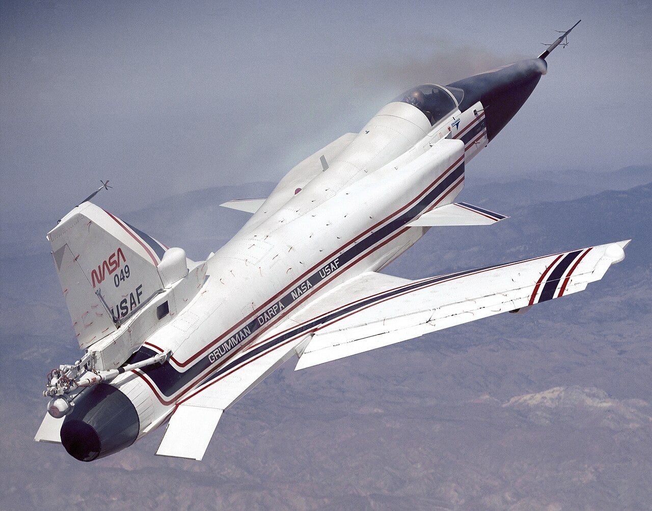 The NASA X-29 flying at high angle of attack with smoke generators