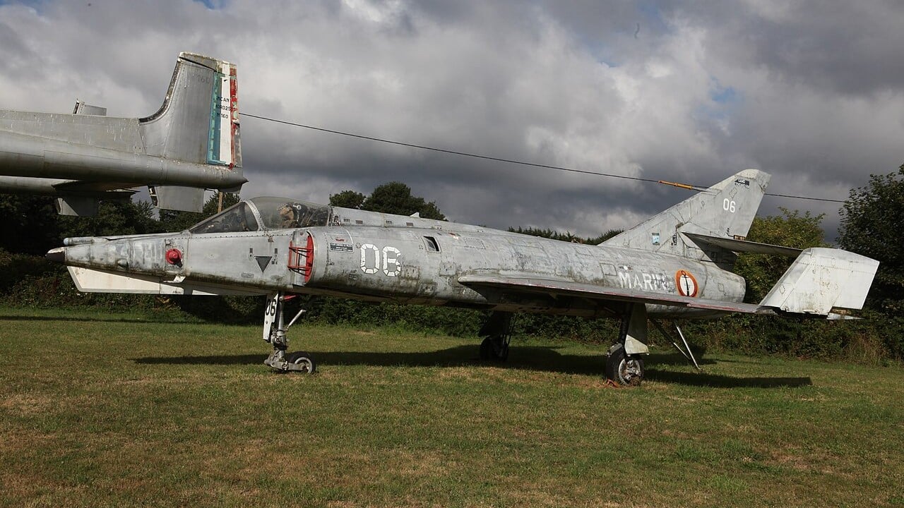 A preserved grey Dassault Étendard IVM of the French Navy on grass at Vannes