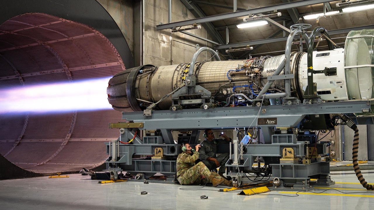 F110 jet engine firing its afterburner into the augmenter tube of a hush house at Hill Air Force Base