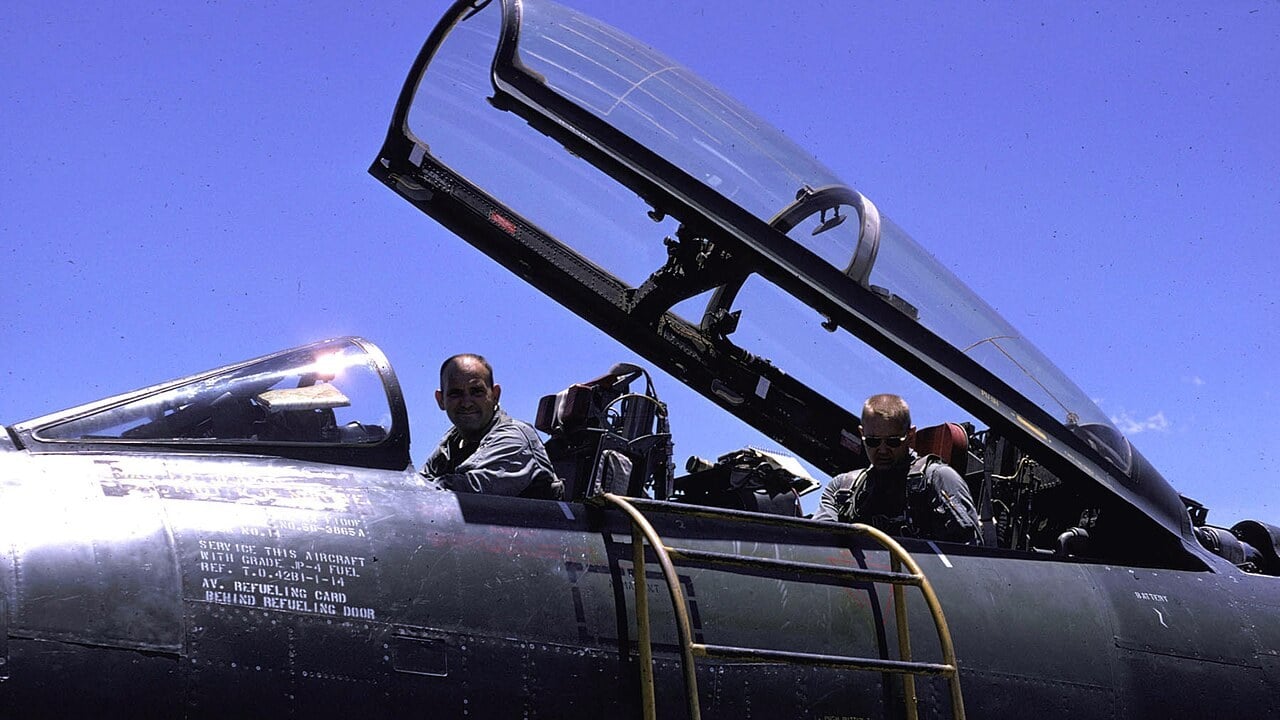 Two US Air Force Misty pilots seated in the tandem cockpits of a two-seat F-100F Super Sabre with its canopy raised, 1968 Two US Air Force Misty pilots seated in the tandem cockpits of a two-seat F-100F Super Sabre with its canopy raised, 1968