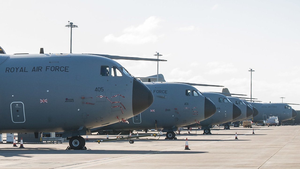 A row of RAF A400M Atlas transport aircraft parked on the apron at RAF Brize Norton A row of RAF A400M Atlas transport aircraft parked on the apron at RAF Brize Norton
