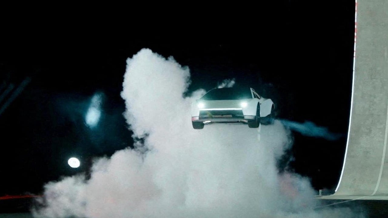 Tesla Roadster leaves the ramp on thrusters The new Tesla Roadster airborne off the end of a ramp in a cloud of thruster exhaust at night
