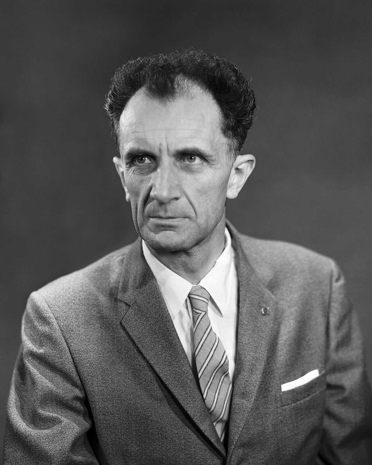Black-and-white portrait of German-American aerodynamicist Adolf Busemann, who first proposed swept wings in 1935