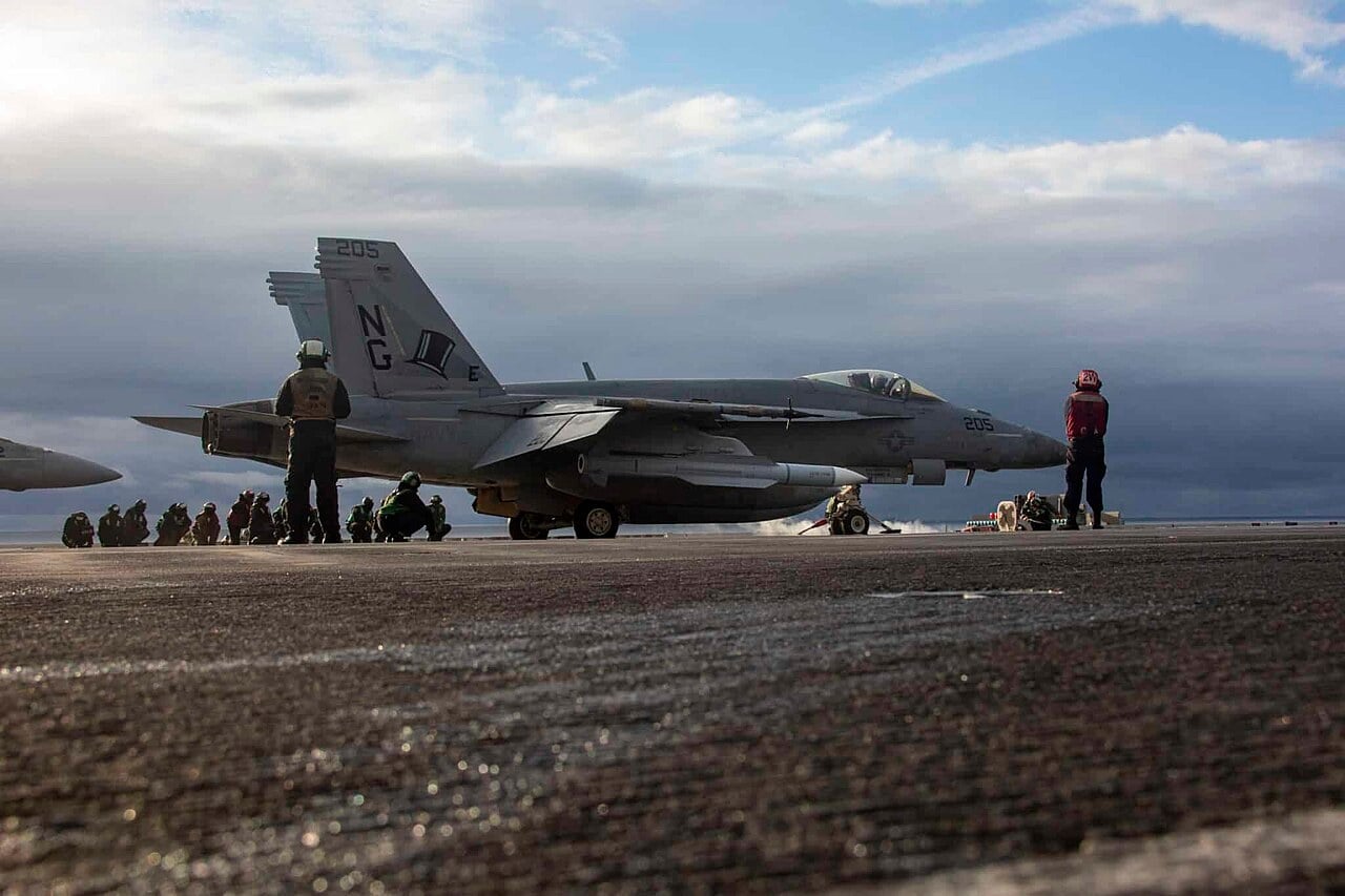 US Navy F/A-18E Super Hornet of VFA-14 carrying an AIM-174B missile on the catapult of USS Abraham Lincoln during Northern Edge 2025