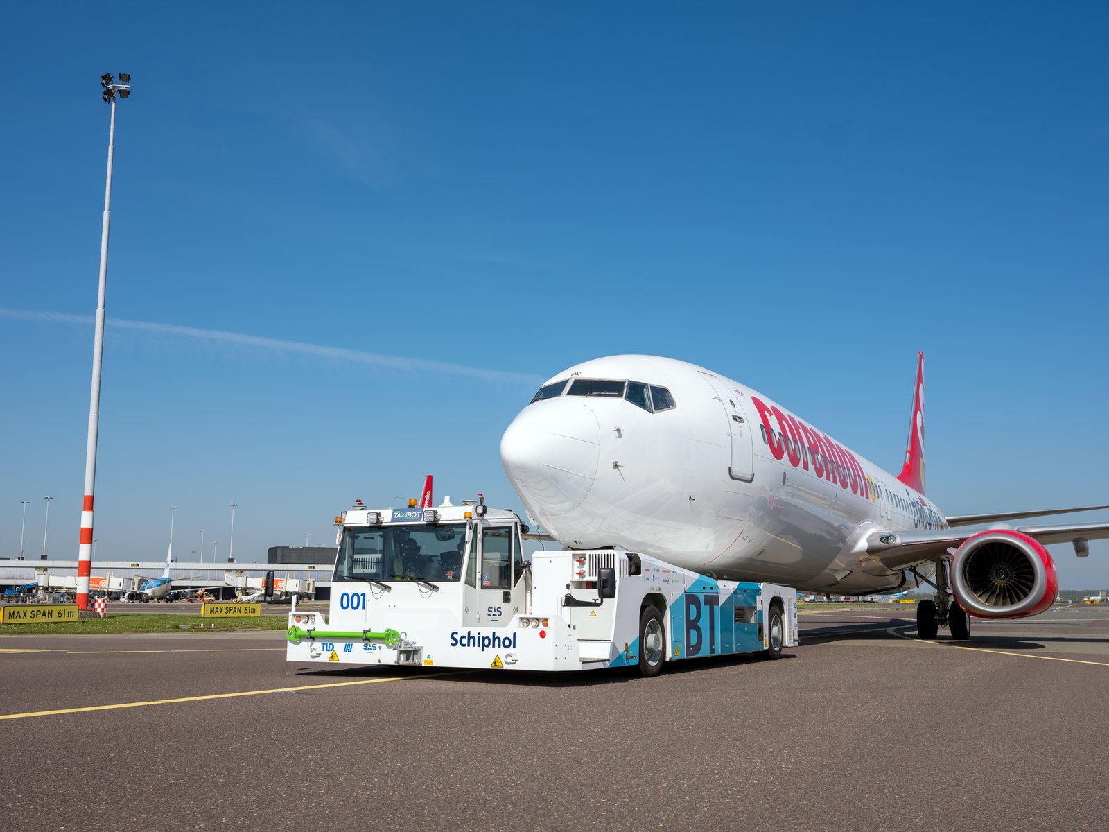 TaxiBot semi-robotic towbarless tractor towing a Corendon Boeing 737 at Amsterdam Schiphol