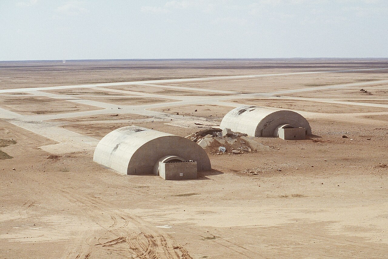 Damaged concrete hardened aircraft shelters at Al-Salman Air Base in Iraq after coalition bombing in 1991