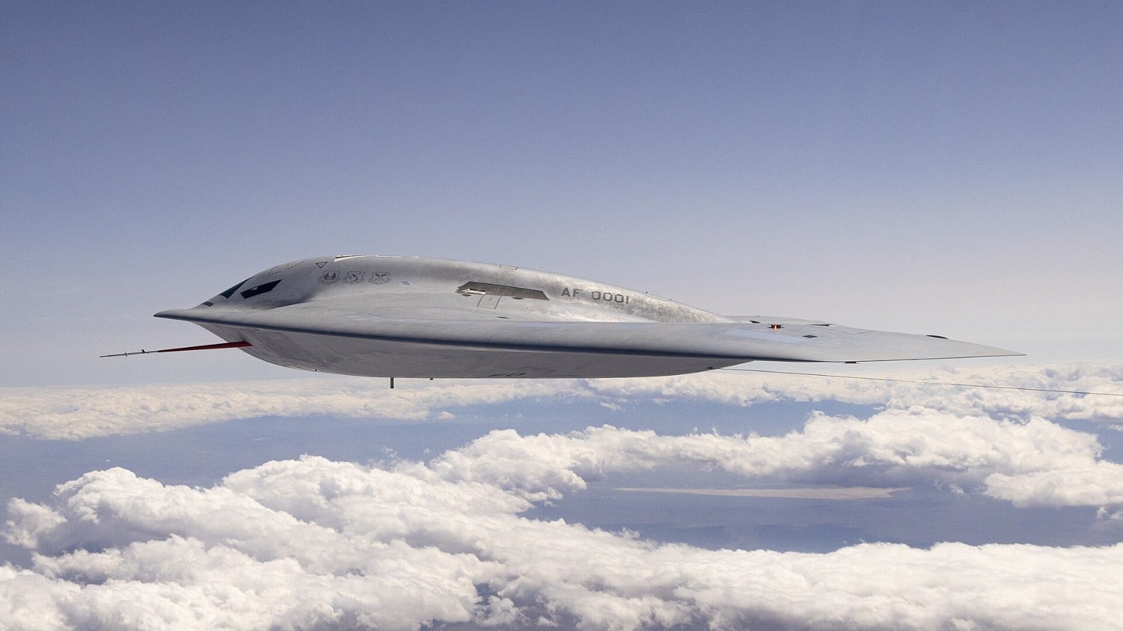 B-21 Air-to-Air Role: USAF Studies Bombers That Hunt Fighters Northrop Grumman B-21 Raider stealth bomber in flight above the clouds