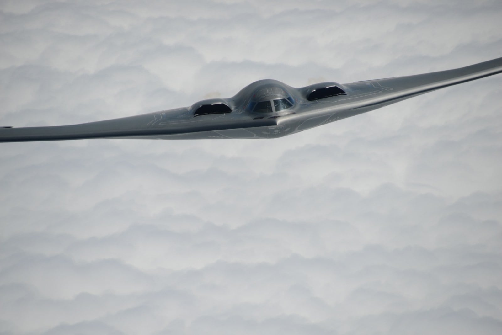 B-2 Spirit stealth bomber of the 509th Bomb Wing approaching a KC-135 tanker over Missouri