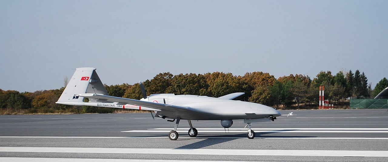 A Bayraktar TB2 on a runway, Turkish Air Force fin flash visible