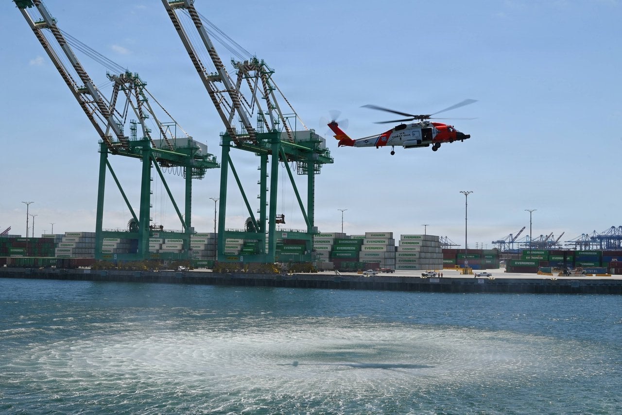US Coast Guard MH-60 Jayhawk from Air Station Ventura flying low over the Port of Los Angeles