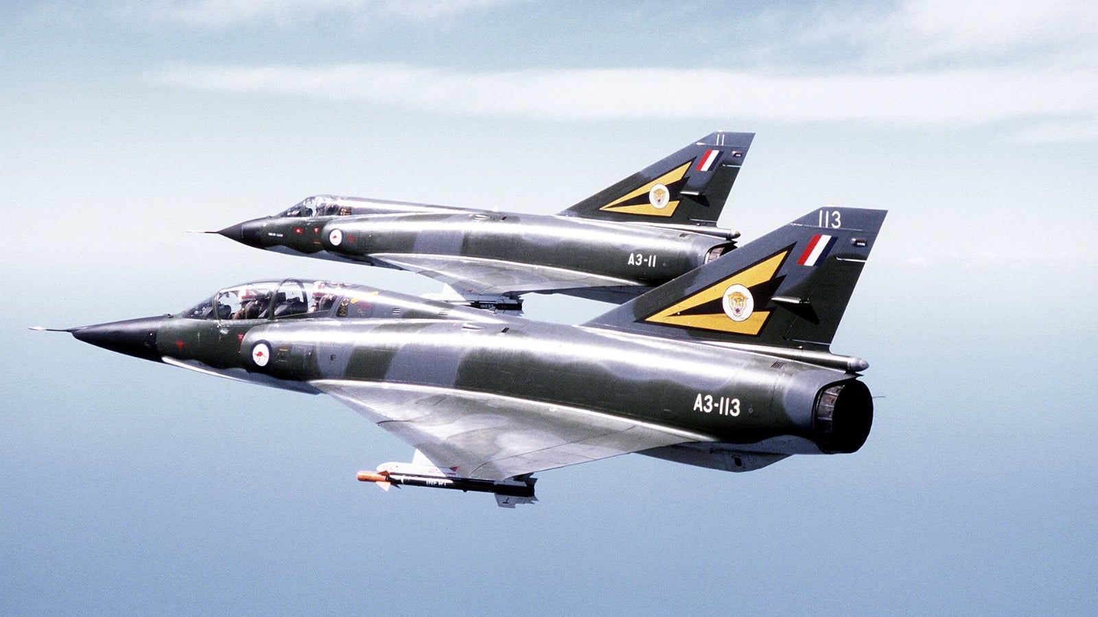 Dassault Mirage III: The Delta That Made France a Fighter Power Two Royal Australian Air Force Dassault Mirage IIIO fighters flying in formation