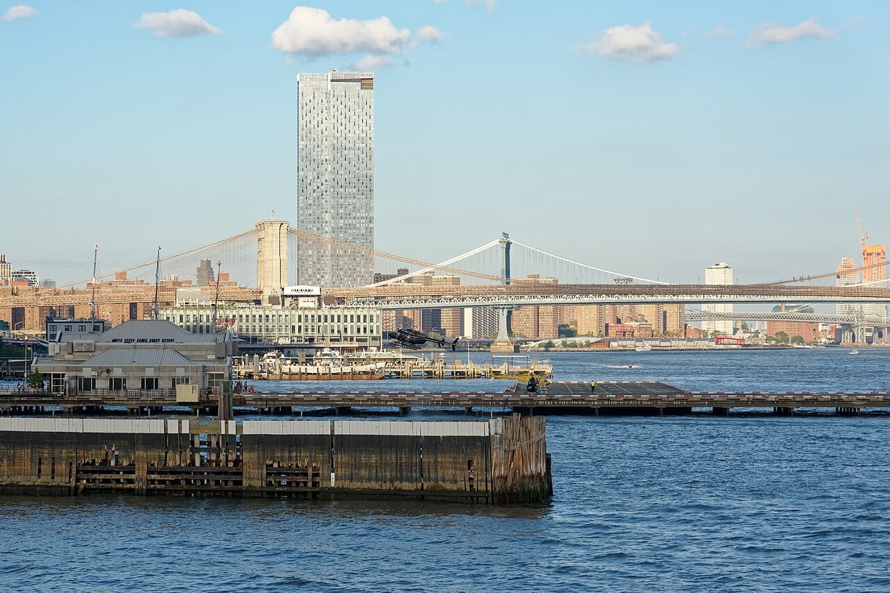 The Downtown Manhattan Heliport at Pier 6 on the East River with the Brooklyn and Manhattan bridges in the background