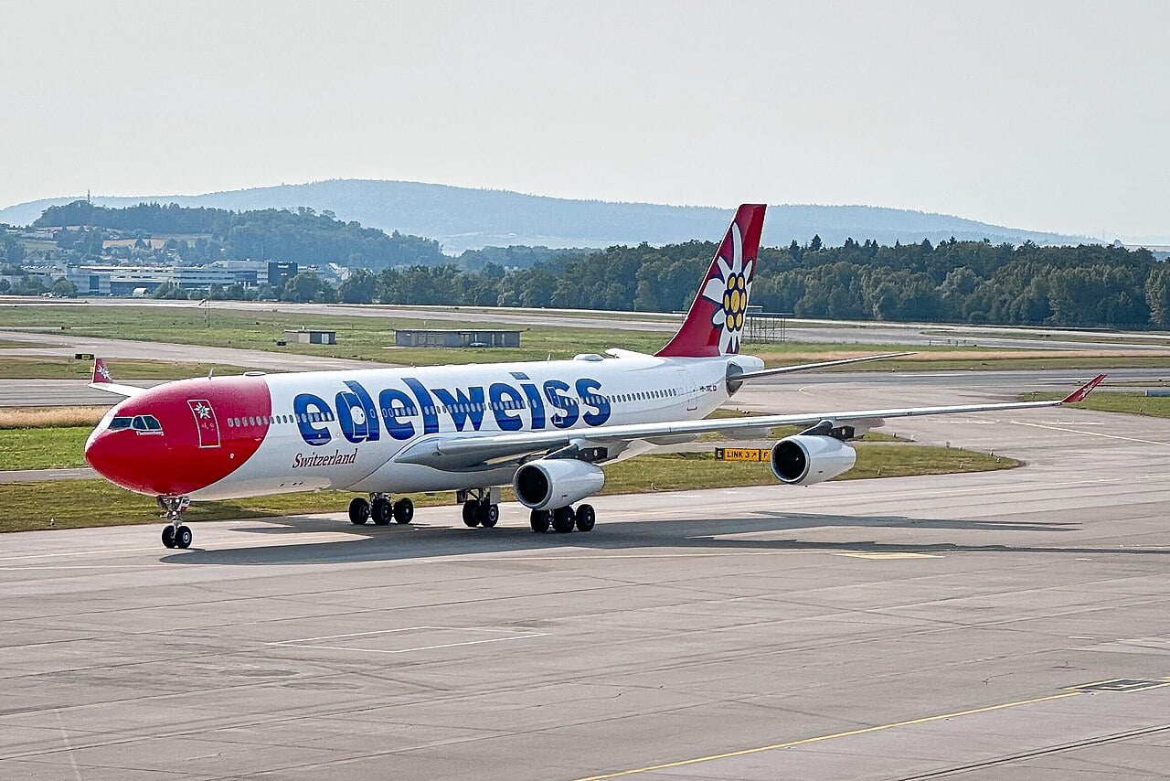 Edelweiss Airbus A340-300 HB-JMC taxiing at Zurich Airport in red and white Edelweiss livery