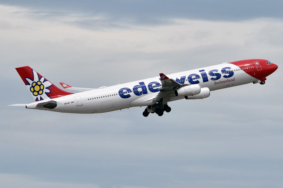 Edelweiss Airbus A340-300 HB-JMC climbing out with its landing gear still extended